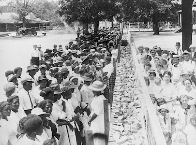 Segregated crowds attend a barbecue at an Alabama plantation.
Credit: America Eats/Library of Congress